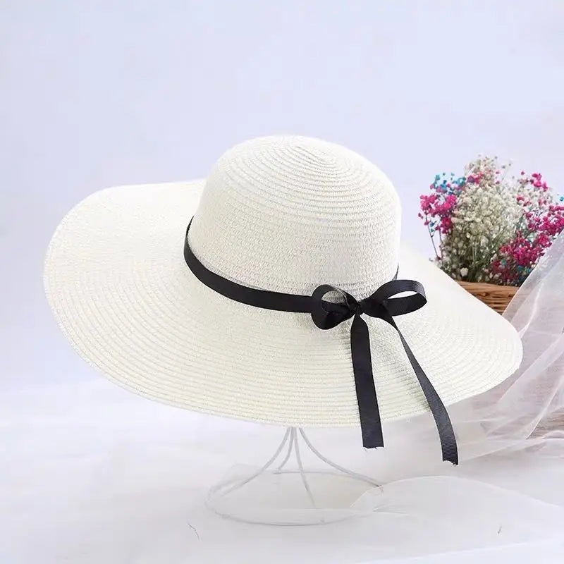 He97c137570ab4e50982dc530861286408 New Simple Foldable Wide Brim Floppy Girls Straw Sun Beach Women Summer Hat Uv Protect Travel Lady Cap Female - Image 1